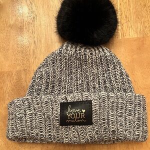 Love Your Melon black & white beanie with snap off black pom, gently used.